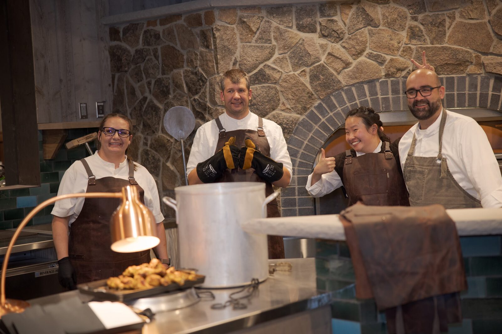 The Jupiter culinary team serving at a campus gathering